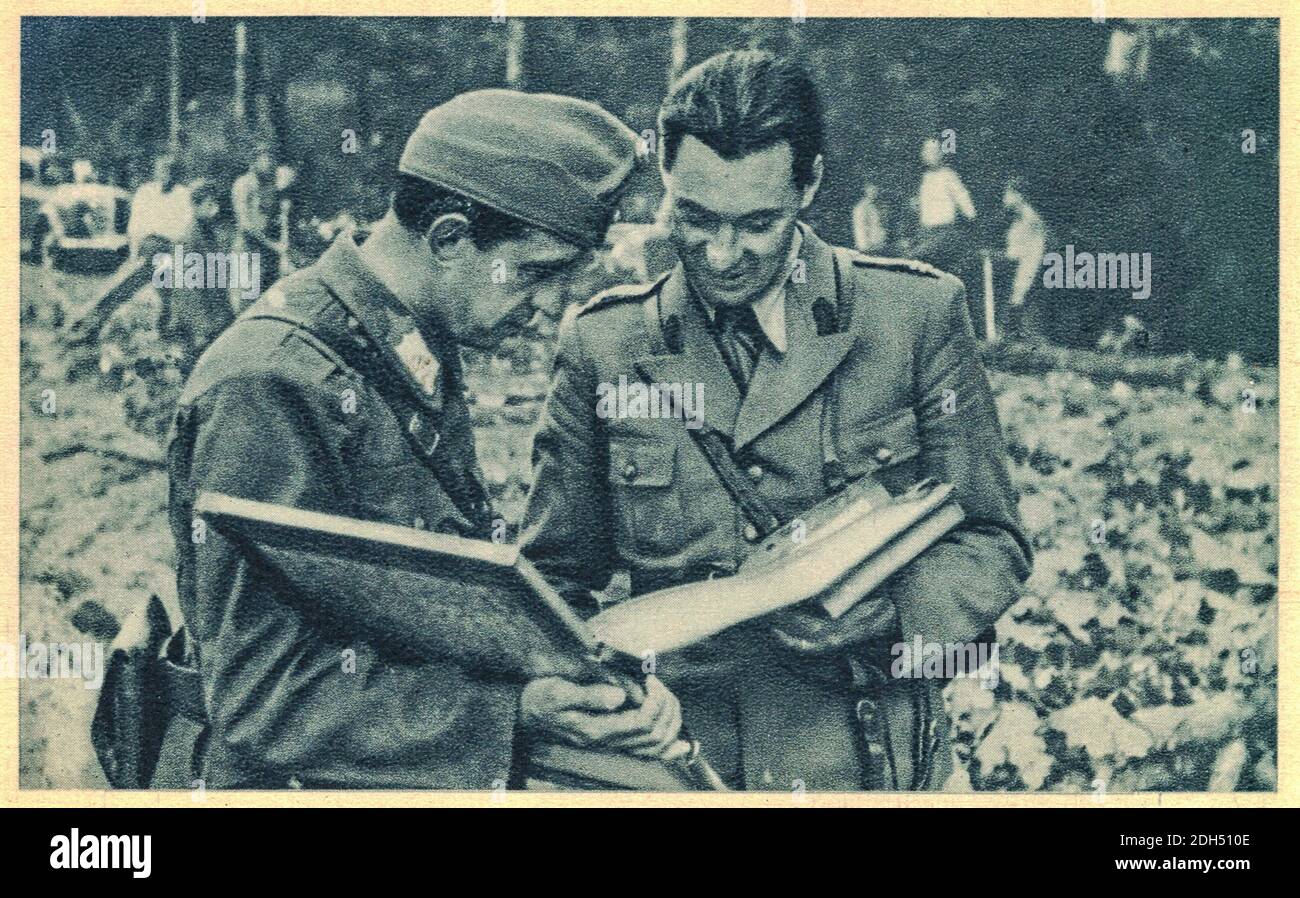 HUNGARY - 1941: Hungarian and Romanian officers have a conversation. World War 2. Axis - Tripartite Pact and states that adhered to the Tripartite Pac Stock Photo