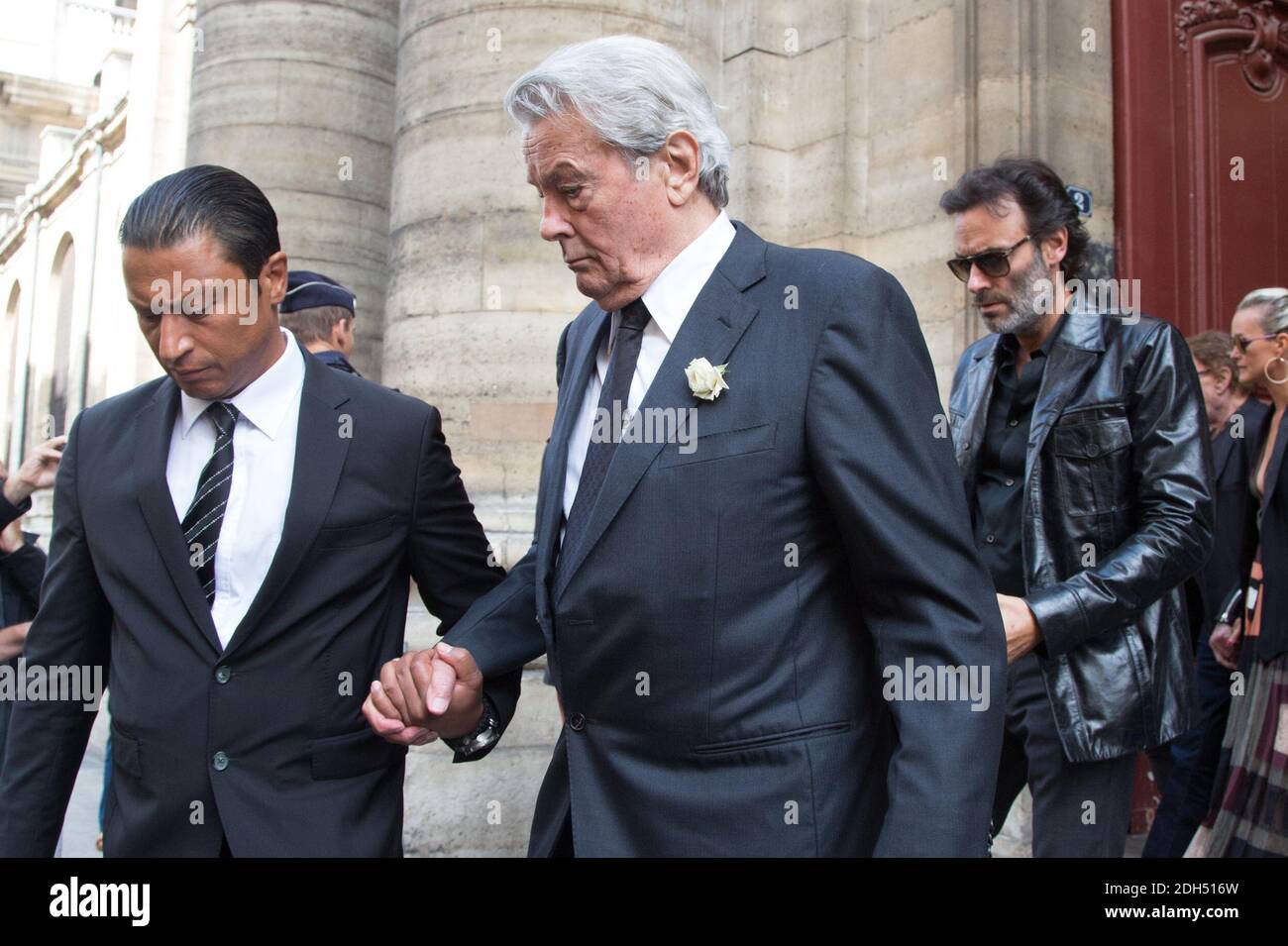 Alain Delon and son Anthony Delon leaving the funerals of the actress