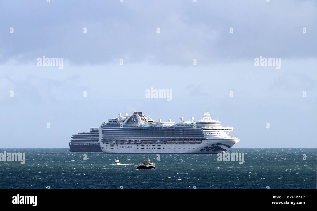 Torbay, Devon, England: The cruise liner, Emerald Princess, moored in Torbay owing to the covid / coronavirus pandemic. Stock Photo