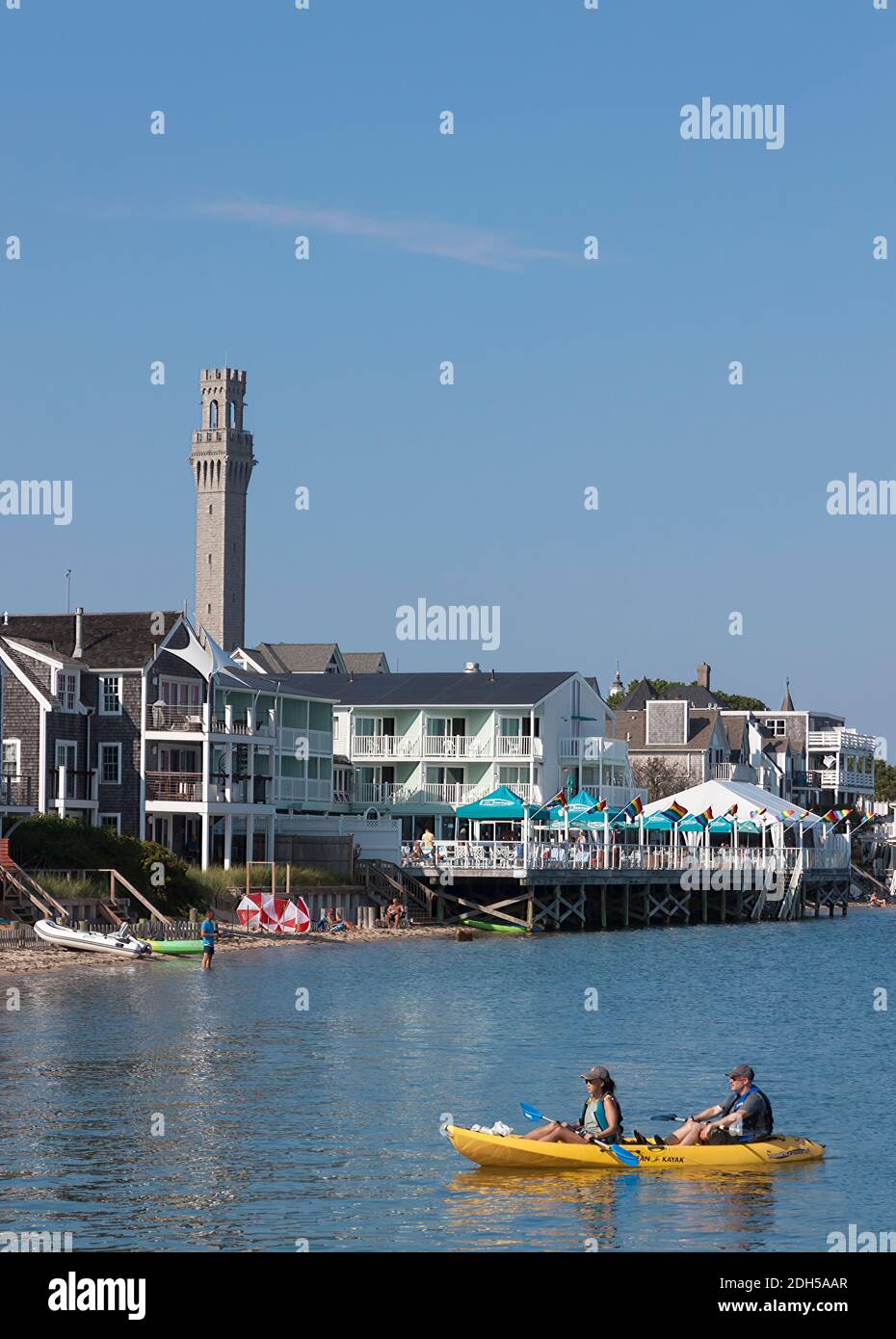 Vacation kayakers (kayak rental) in Cape Cod Bay, Provincetown, Massachusetts. Stock Photo