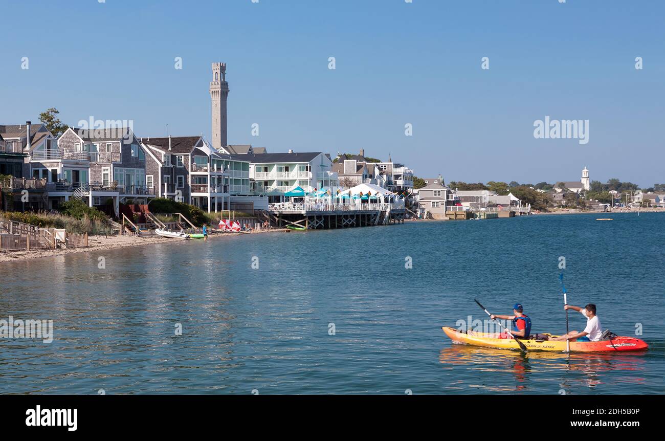 Vacation kayakers (kayak rental) in Cape Cod Bay, Provincetown, Massachusetts. Stock Photo