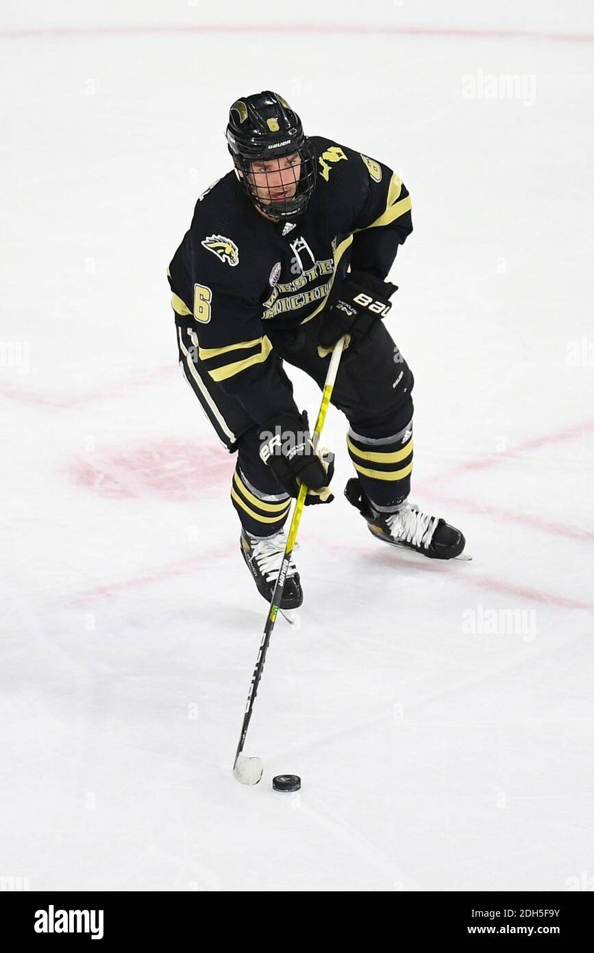 Omaha, NE, USA. December 9, 2020 Western Michigan Broncos defenseman  Scooter Brickey (6) skates with the puck during a NCAA D1 men's hockey game  between the Western Michigan University Brocos and the