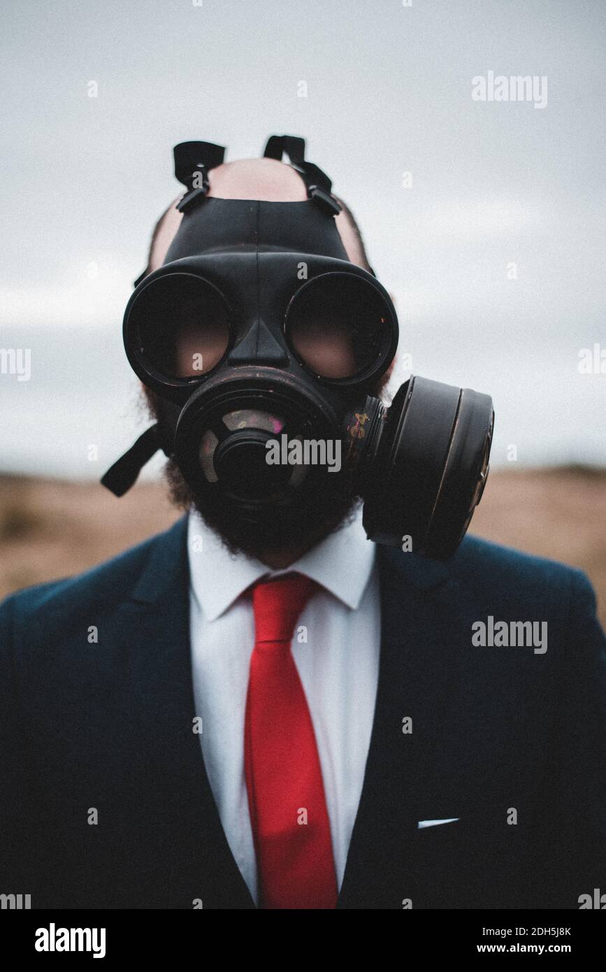 Businessman wearing gas mask hi-res stock photography and images - Alamy