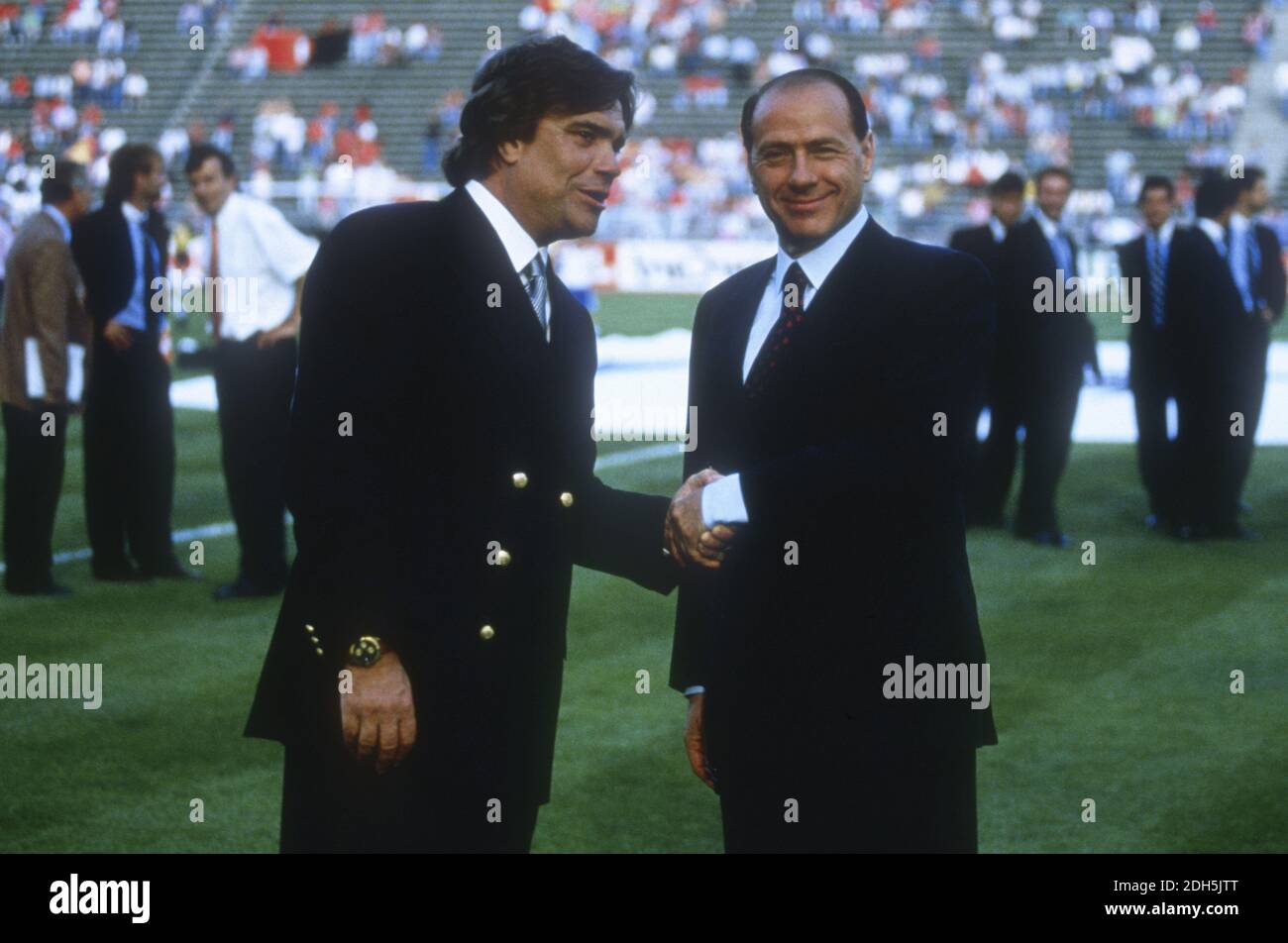 Marseille's President Bernard Tapie greeting Milan AC's President Silvio  Berlusconi during the Champions's League Final soccer match, Marseille vs  Milan A.C. in Stade Olympique, Munich, Germany on May 26th, 1993. Marseille  won