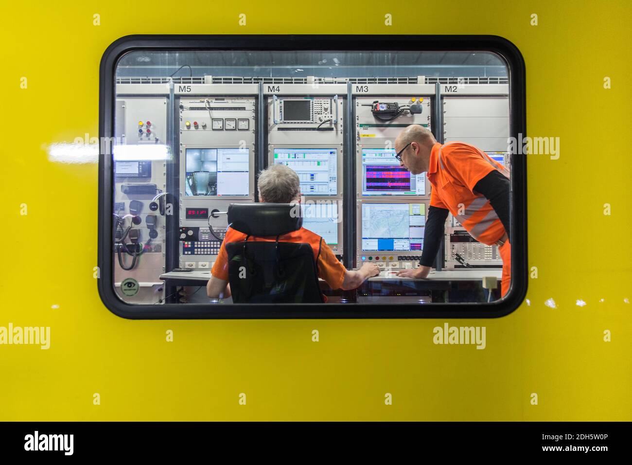 NO WEB/NO APPS - Engineers are analysing the data collected during the train tests ahead of the inauguration of the Gotthard Base Tunnel (GBT) at the multifunctional station of Sedrun, Switzerland in March 2016. The Gotthard Base Tunnel (GBT) is a railway tunnel through the Alps in Switzerland. It opened on 1 June 2016, and full service began on 11 December 2016. With a route length of 57.09 km and a total of 151.84 km of tunnels, shafts and passages, it is the world’s longest and deepest traffic tunnel and the first flat, low-level route through the Alps. It is the deepest railway tunnel in t Stock Photo