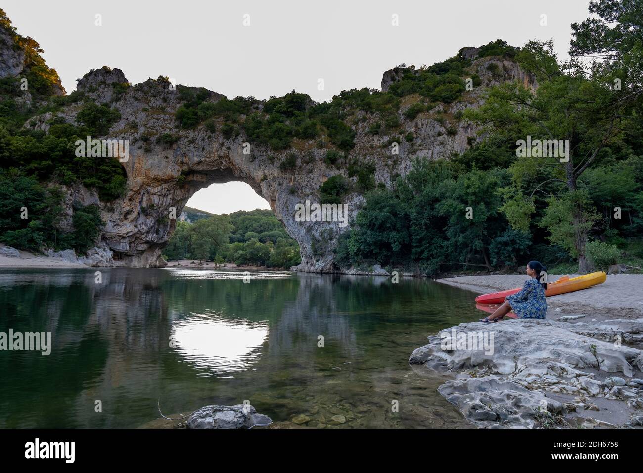 Woman on the beach by the river in the Ardeche France Pont d Arc ...