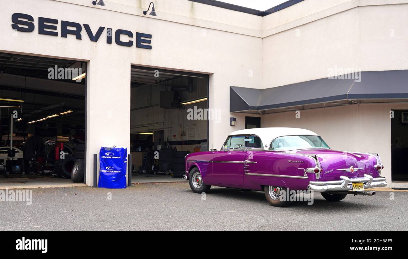 RED BANK, NJ 16 JUL 2020 View of a purple vintage Packard car with