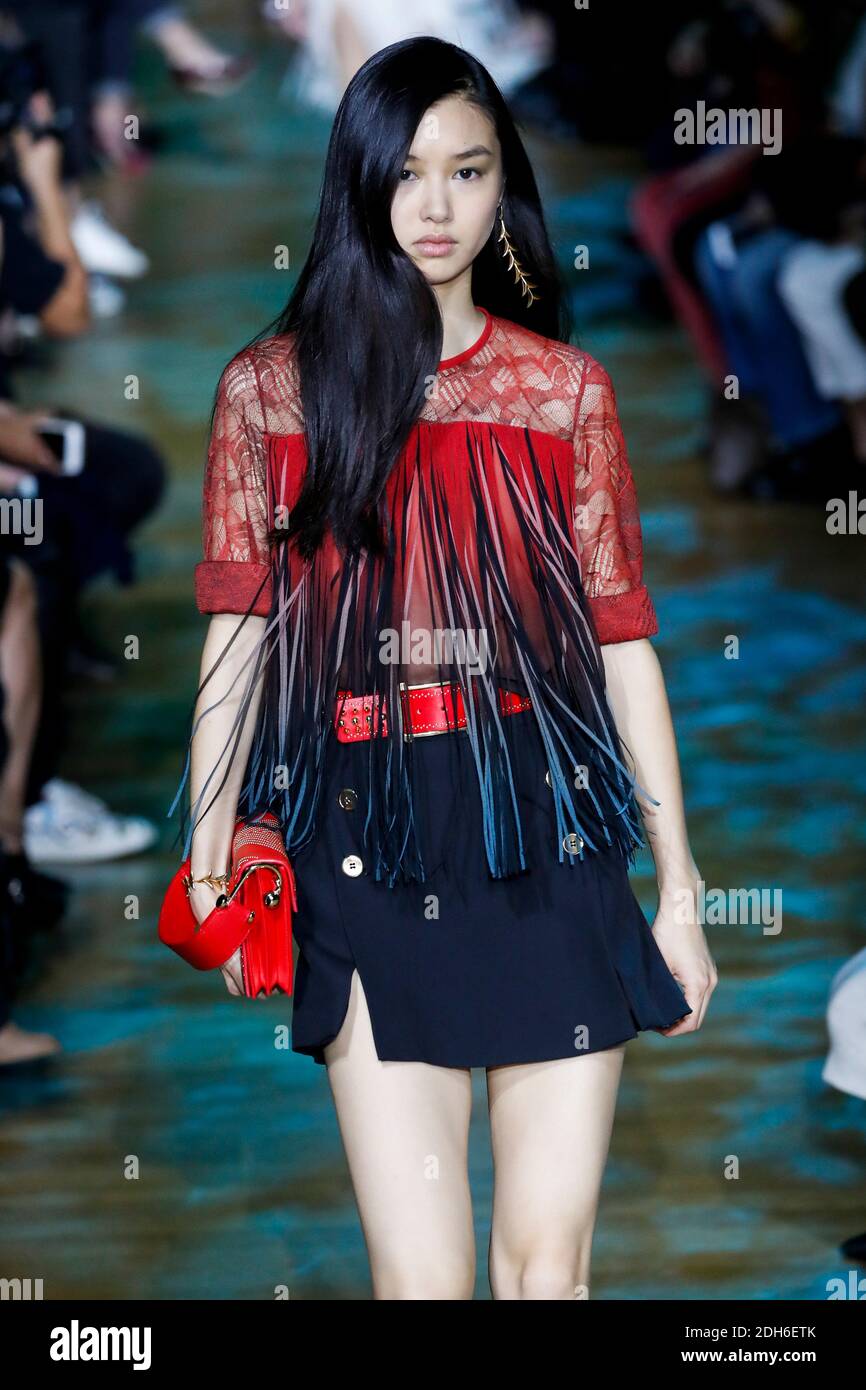 Estelle Chen walks the runway during the Elie Saab show as part of the  Paris Fashion