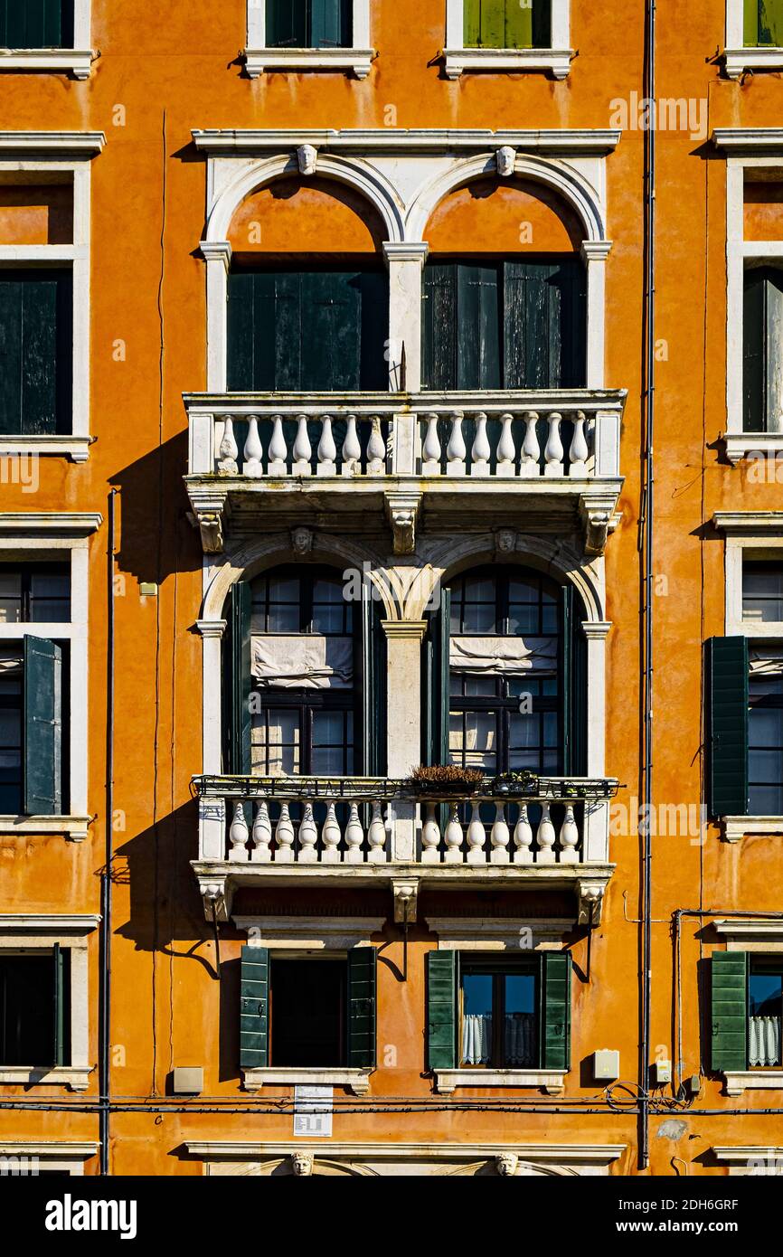 Italian culture on Venetian facades. Stock Photo