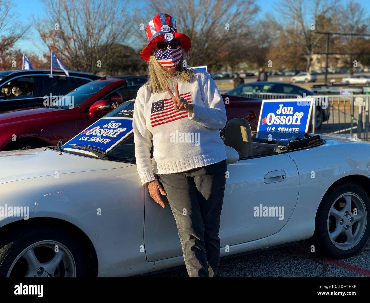 Macon, Georgia, USA. 9th Dec, 2020. Flashing a V for Victory sign, Linda LesterÃs hat and car display her confidence that Democratic Jon Ossoff will win a Senate seat in his upcoming run-off race. Credit: Sue Dorfman/ZUMA Wire/Alamy Live News Stock Photo
