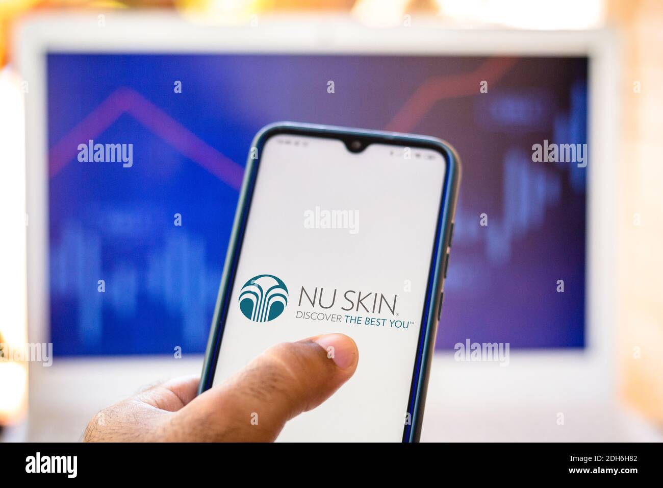 In this photo illustration the Nu Skin Enterprises logo seen displayed on a smartphone. Stock Photo