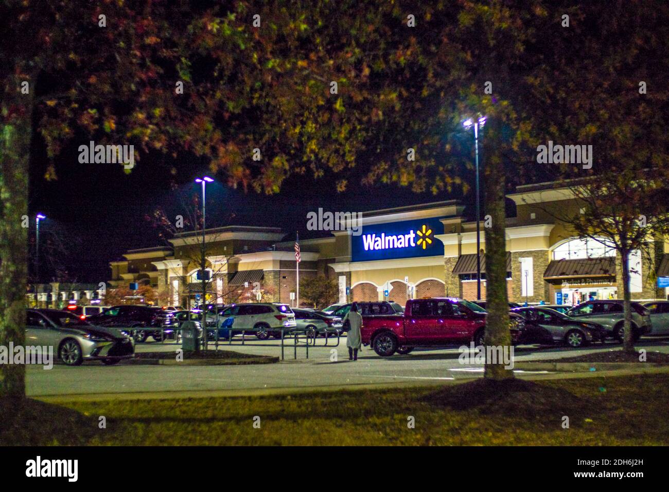 Augusta, Ga USA 12 01 20 Walmart at night and cars with people Stock