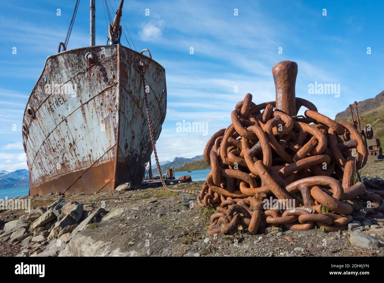 Shipwreck and rusty chain on the beach, Grytviken (abandoned whaling station), South Georgia, Antarctica Stock Photo