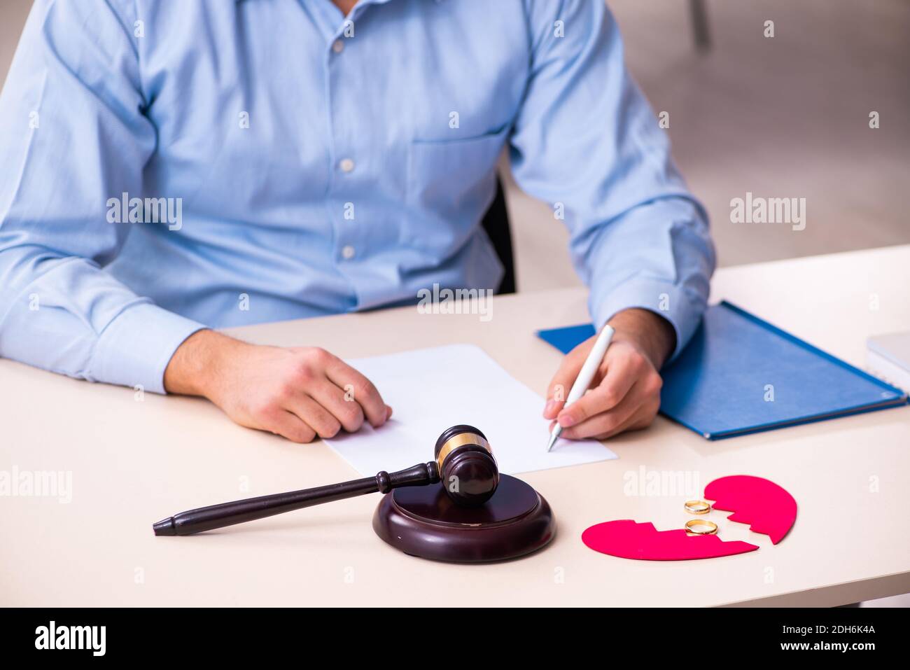 Young man in courthouse in divorcing concept Stock Photo