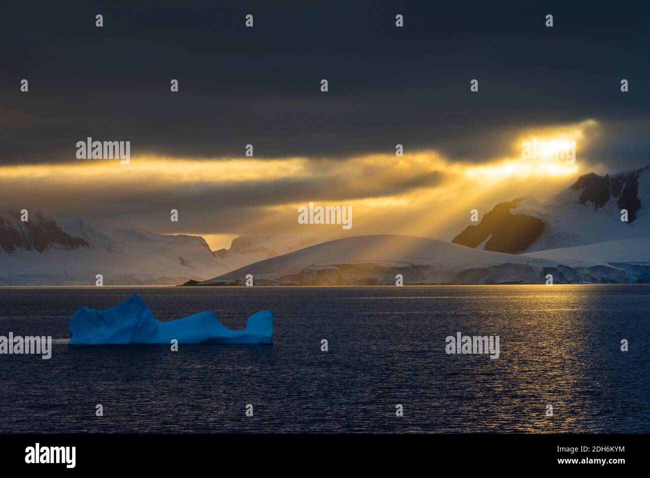 Sunlight breaking through the clouds above the South Atlantic Ocean, Antarctica Stock Photo