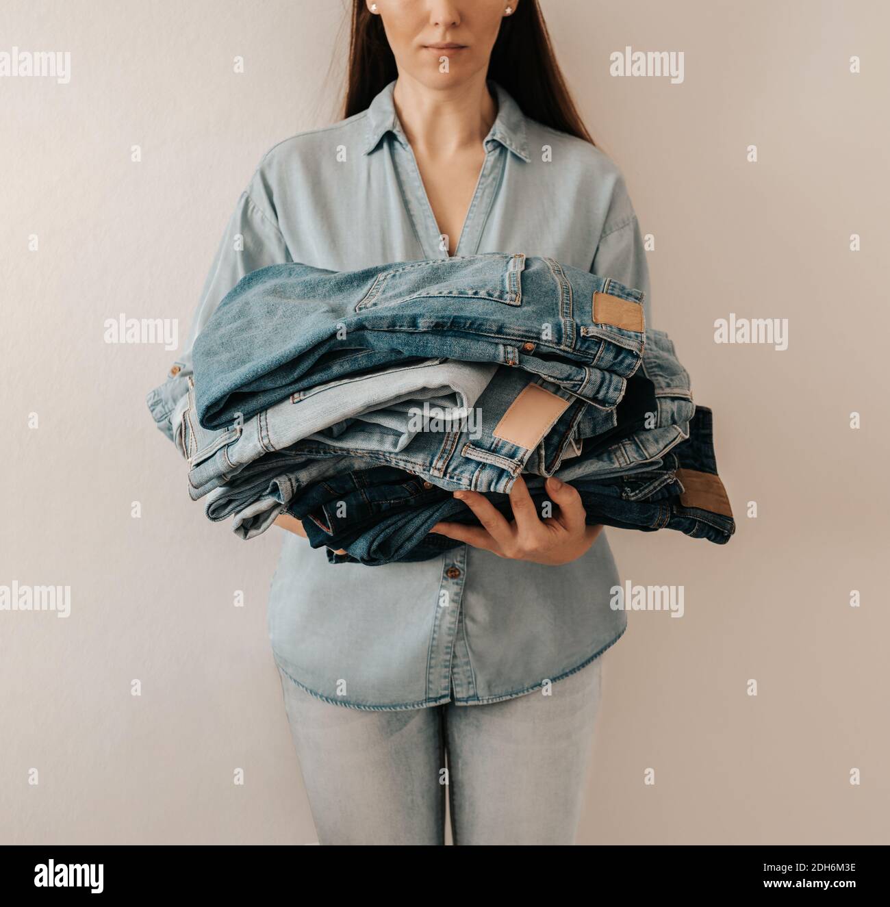 Denim care, jeans sale, recycling wear, fast fashion concept Stock Photo