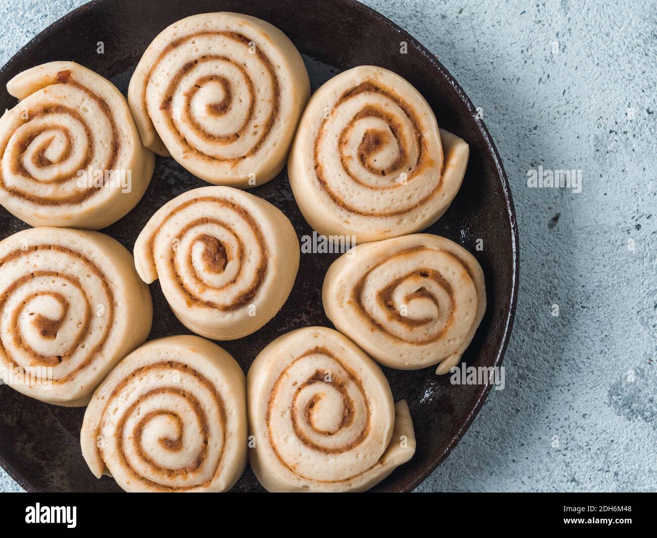 Vegan cinnamon rolls raw dough, top view Stock Photo
