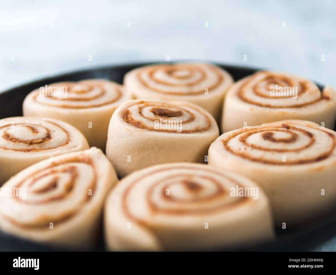Vegan cinnamon rolls raw dough, top view Stock Photo