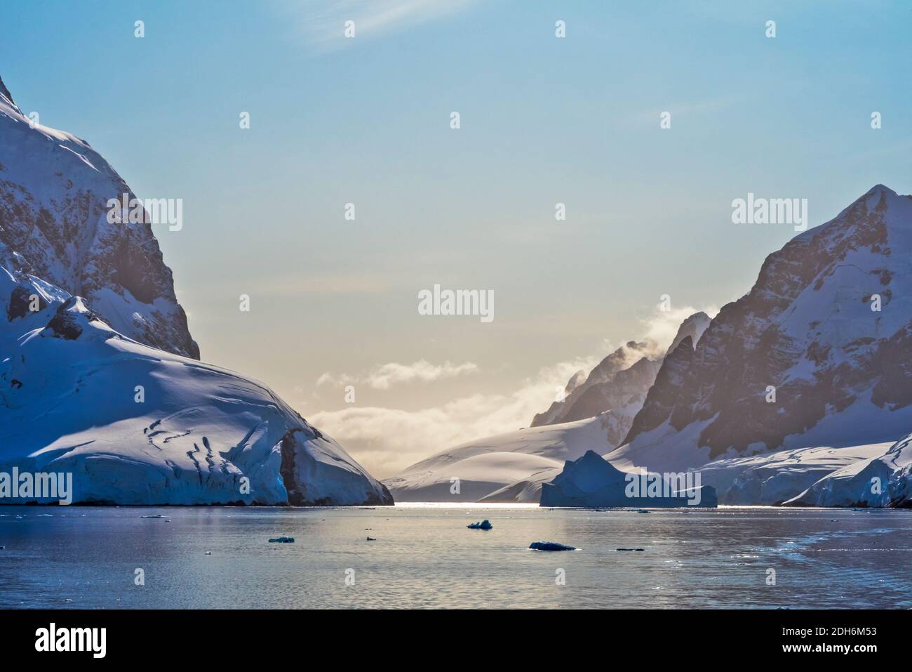 Landscape of snow covered island with iceberg in South Atlantic Ocean, Antarctica Stock Photo
