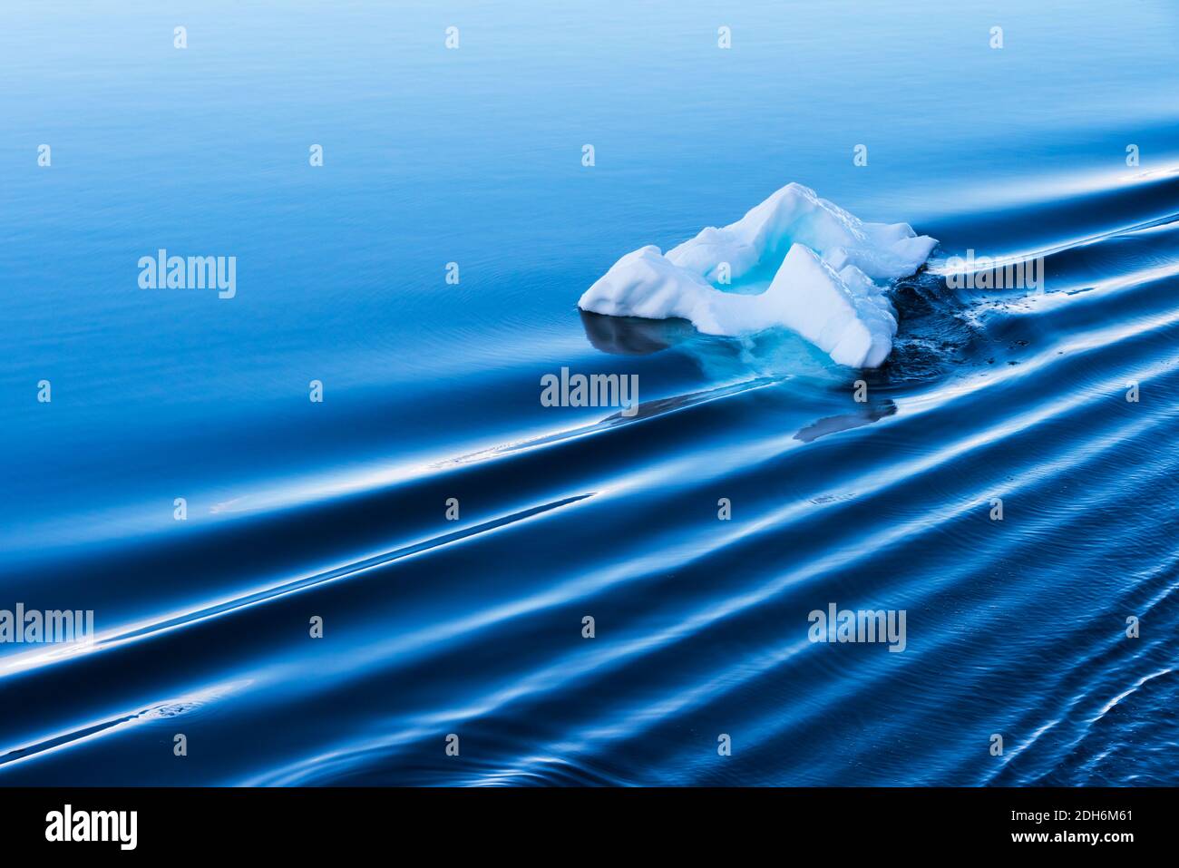 Floating ice with water ripple pattern in South Atlantic Ocean, Antarctica Stock Photo