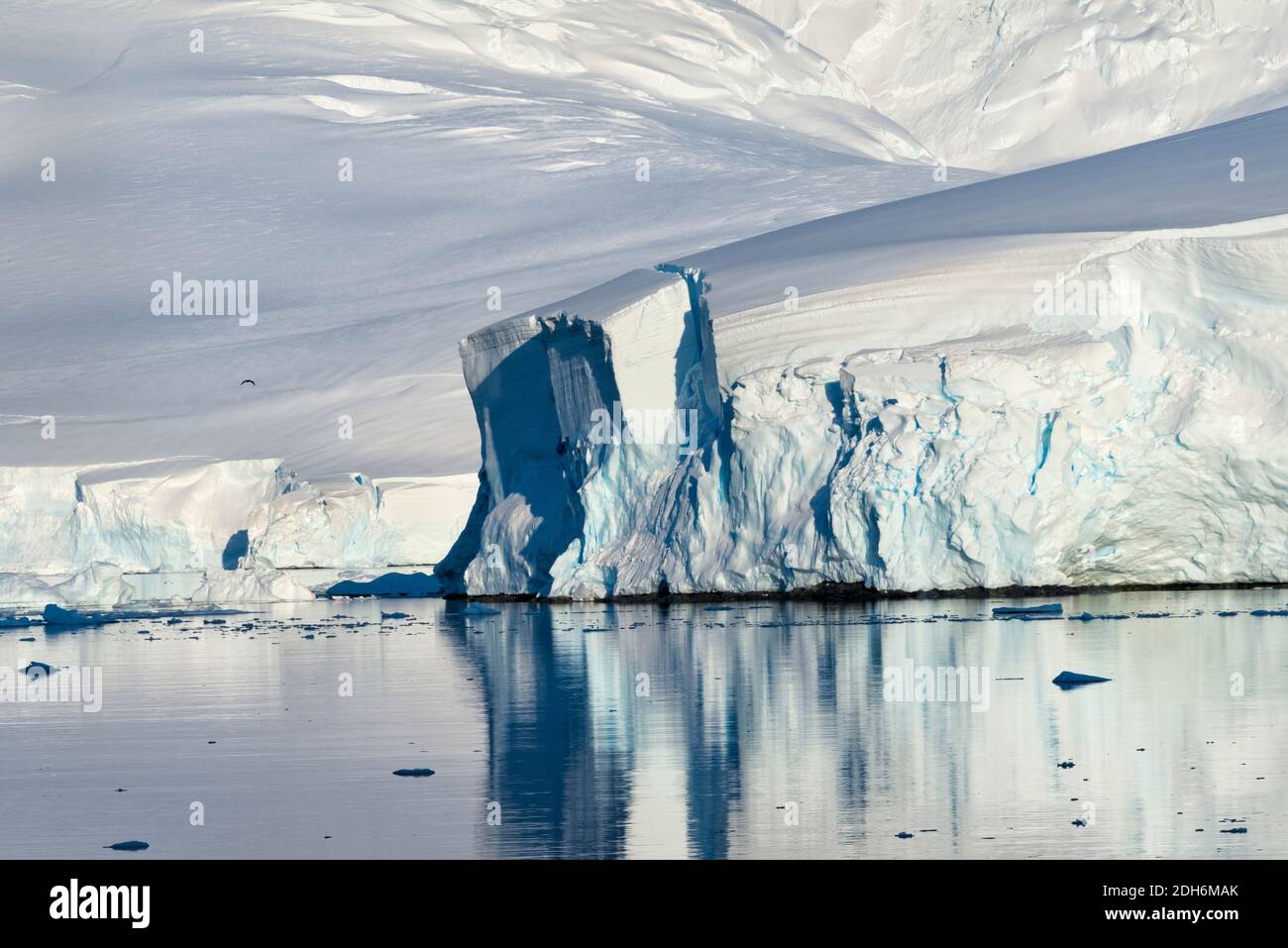 Iceberg with reflection in South Atlantic Ocean, Antarctica Stock Photo