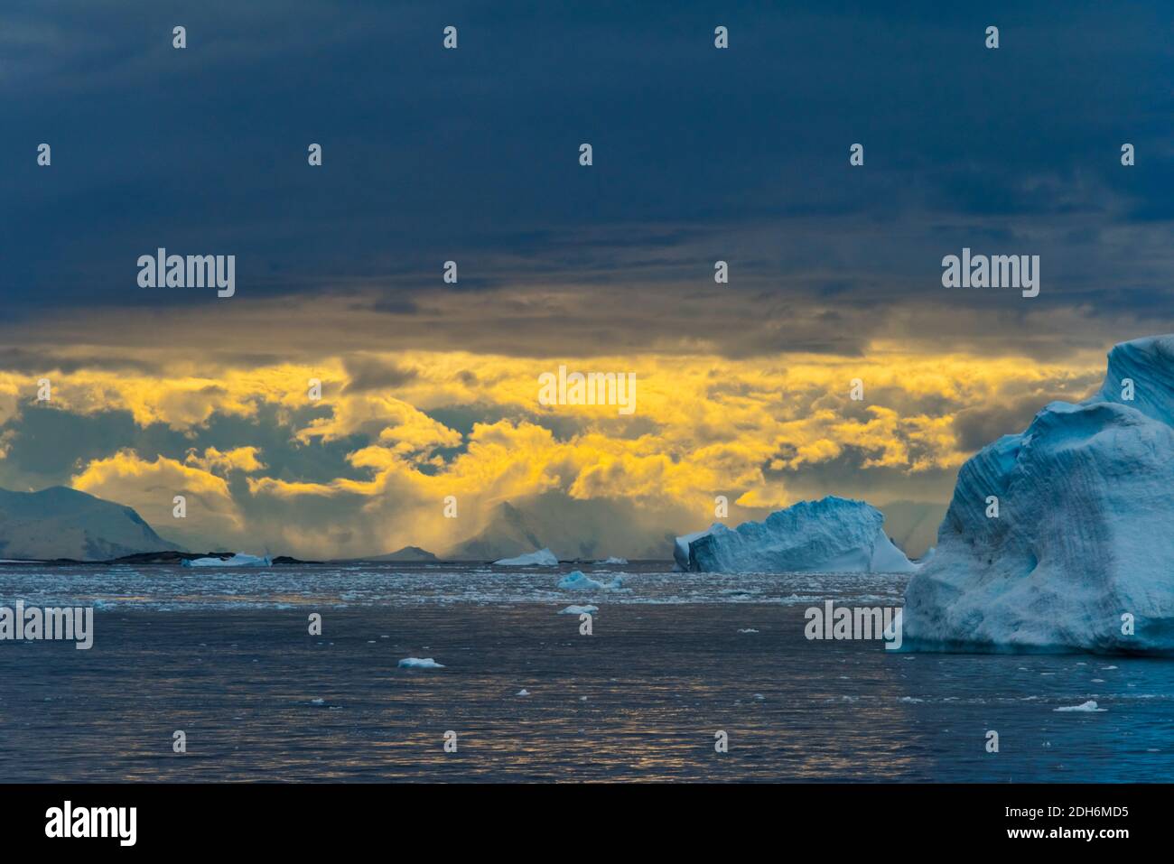 Iceberg in South Atlantic Ocean at sunrise, Antarctica Stock Photo