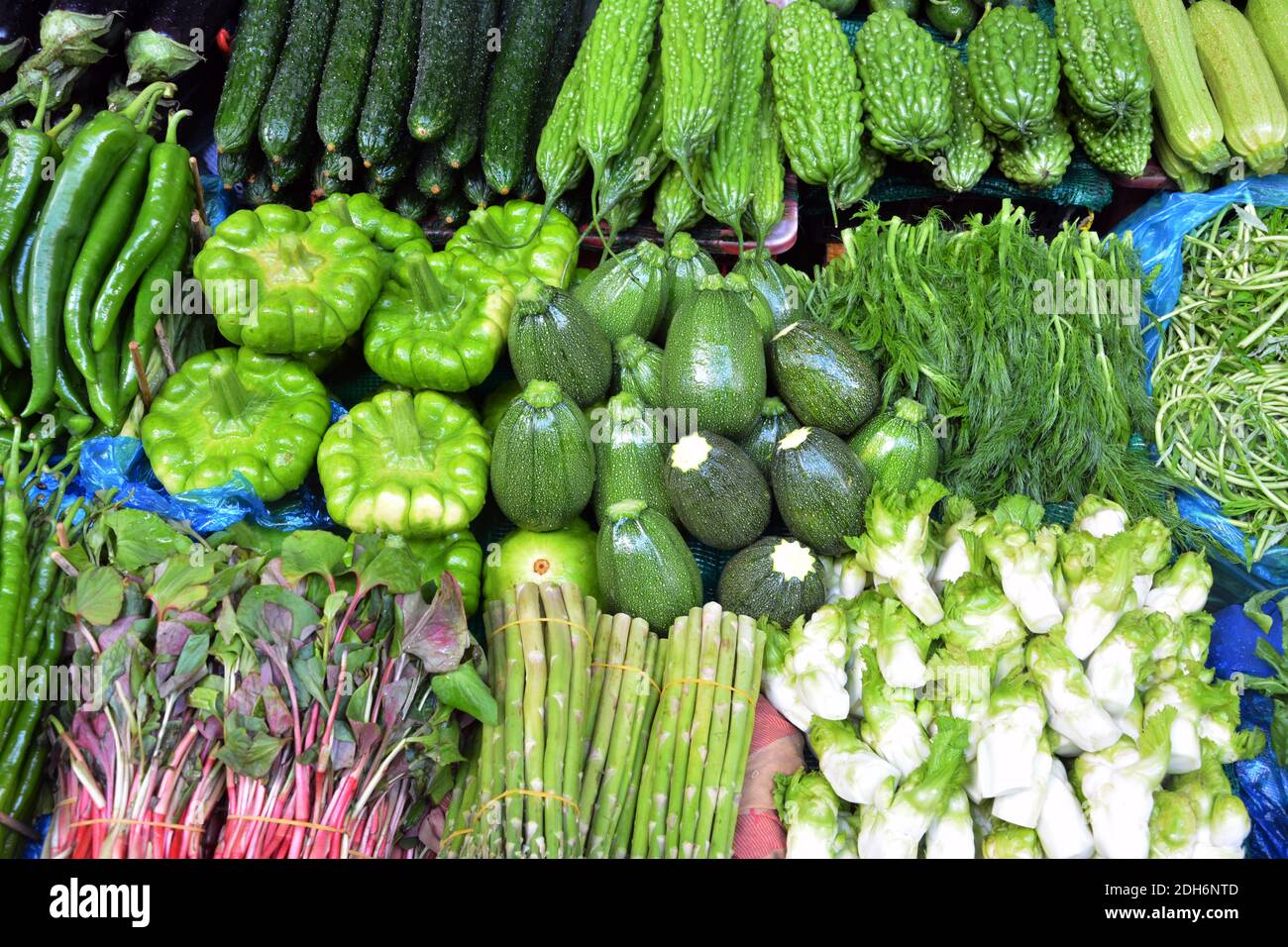 heap of fresh vegetables on the stall for sale in the market Stock Photo