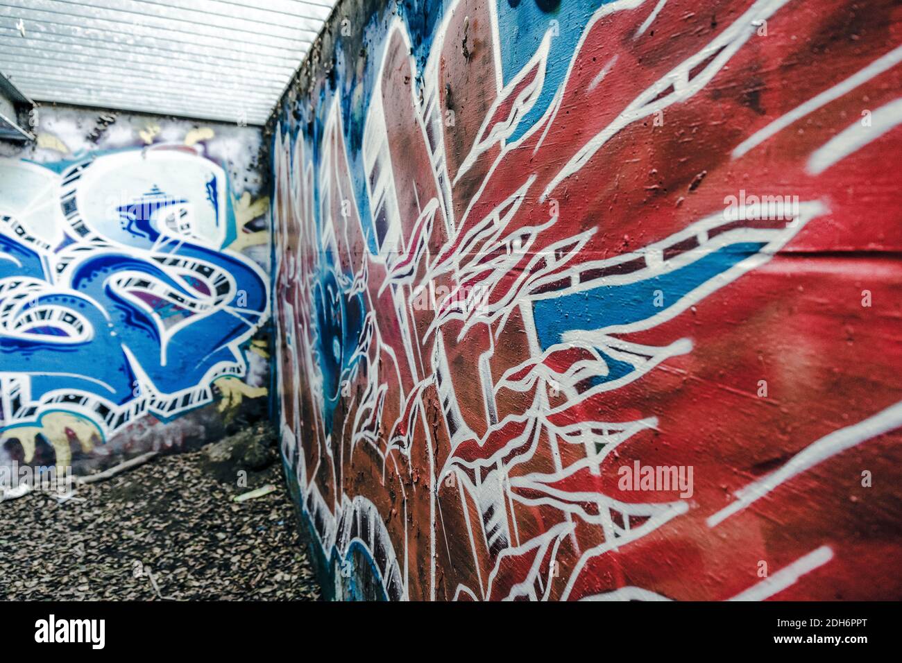 Vibrant Graffiti lines the walls of a California Sewer Stock Photo