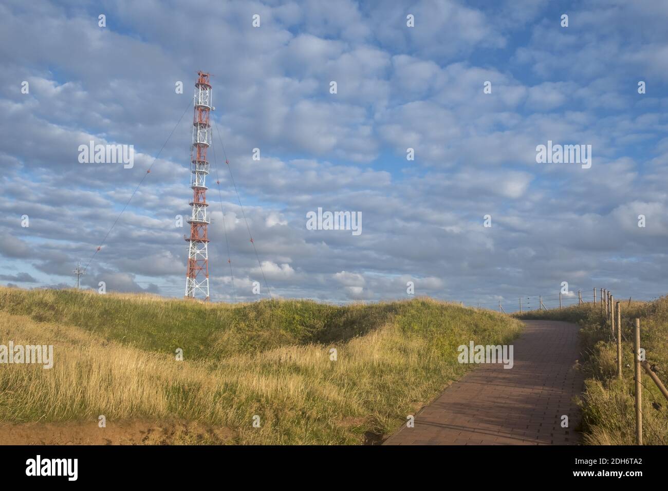 Cliff edge path and transmission tower, Helgoland Stock Photo