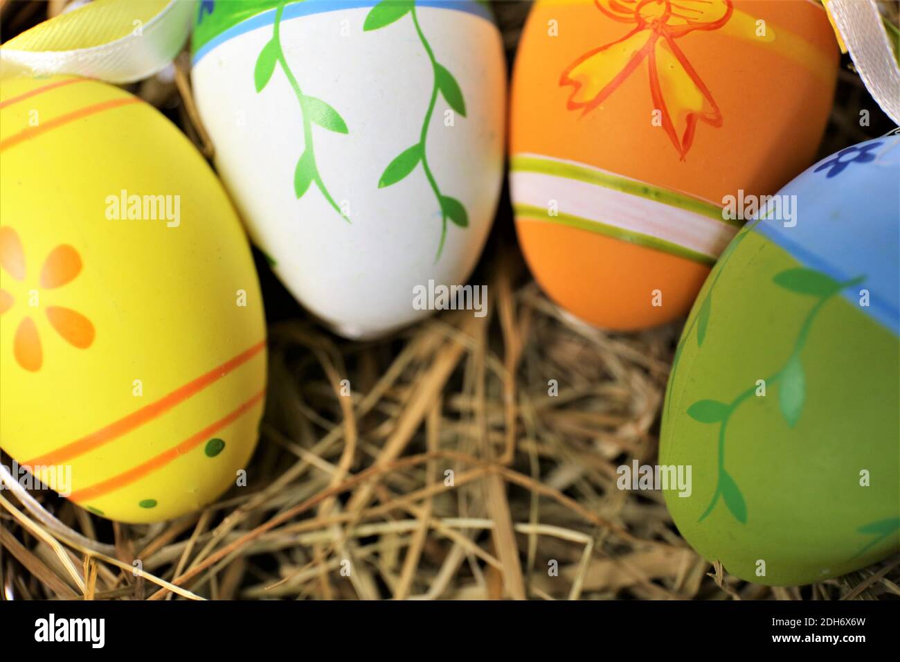 easter eggs in basket on white background Stock Photo