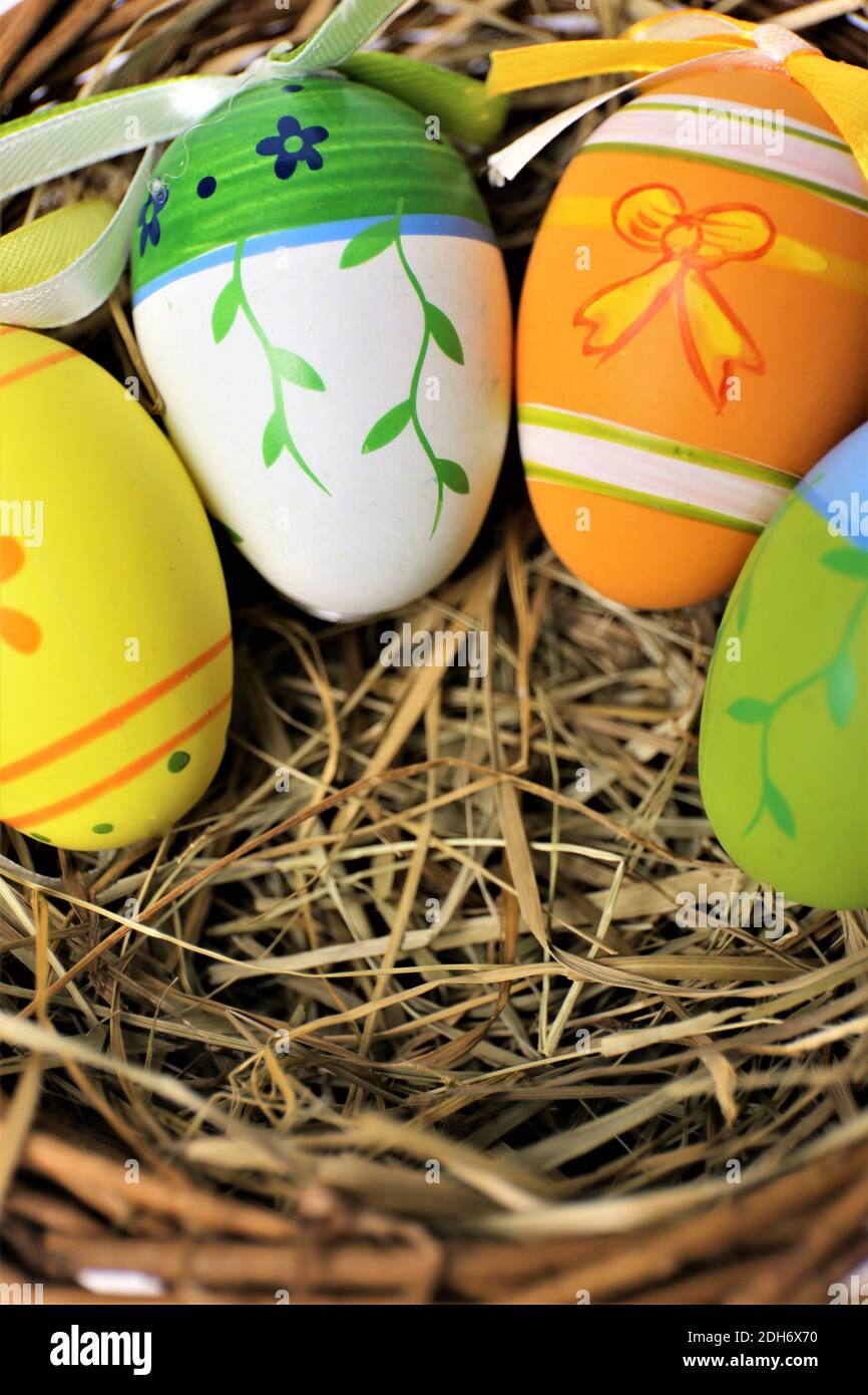 easter eggs in basket on white background Stock Photo - Alamy