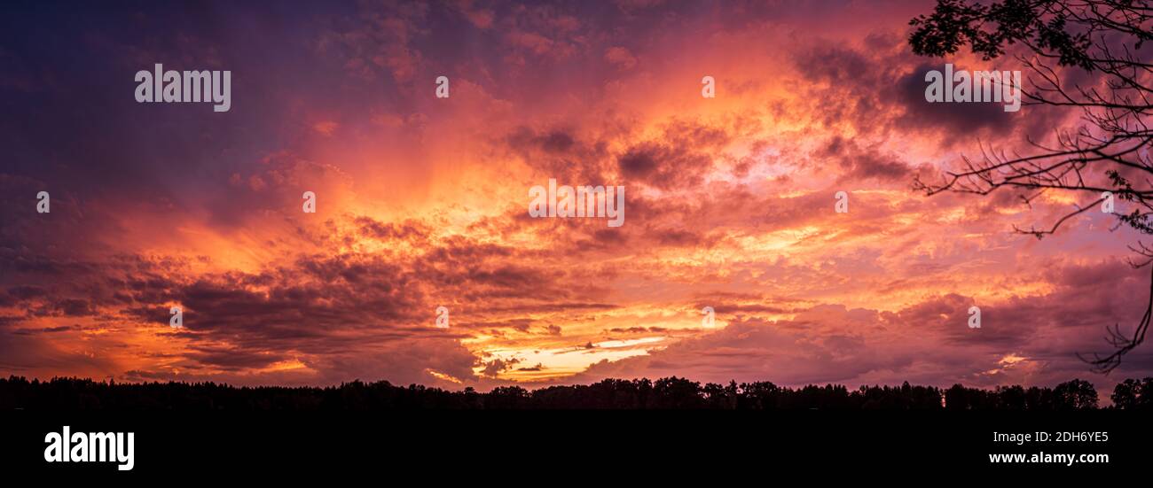 Colorful and dramatic sky panorama of sunset background Stock Photo - Alamy