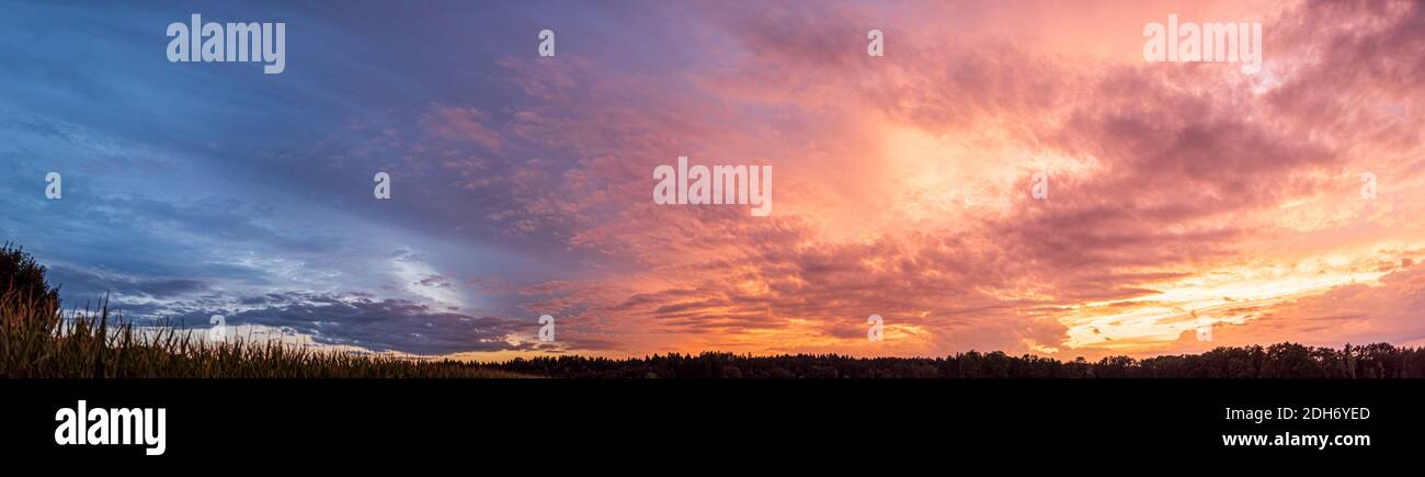 Colorful and dramatic sky panorama of sunset background Stock Photo - Alamy