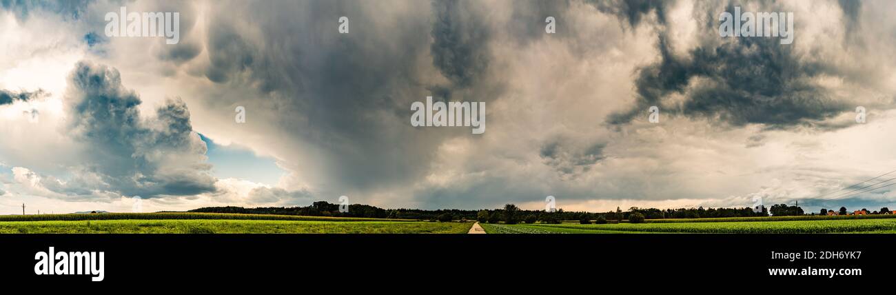 Stormy and dramatic sky panorama of rural area Stock Photo - Alamy