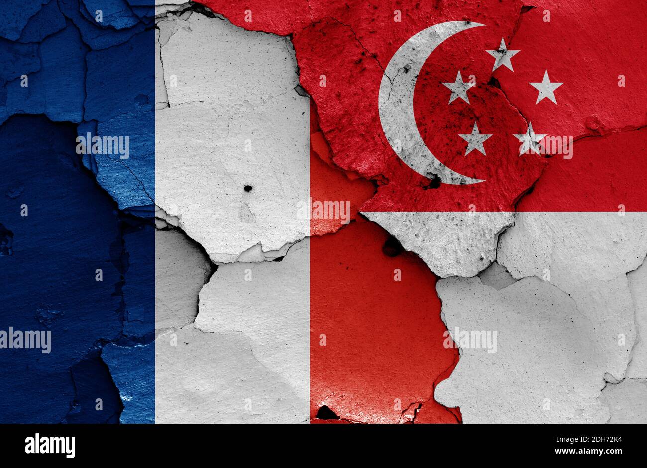 Flags of France and Singapore painted on cracked wall Stock Photo Alamy