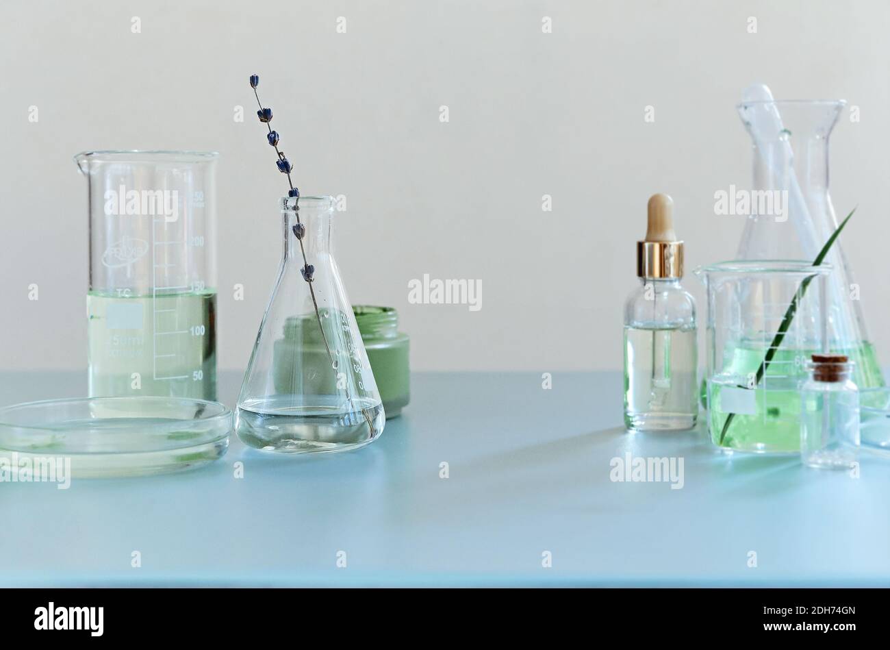 Various bottles on table in laboratory Stock Photo Alamy