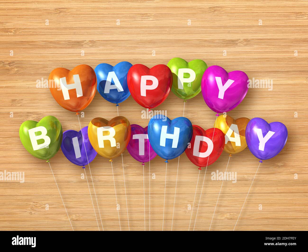 Colorful happy birthday heart shape air balloons on a wooden background ...