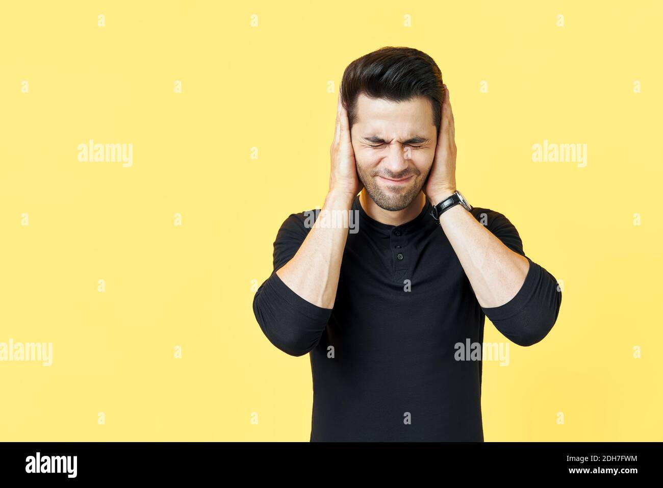 Person covering ears bad sound hires stock photography and images Alamy