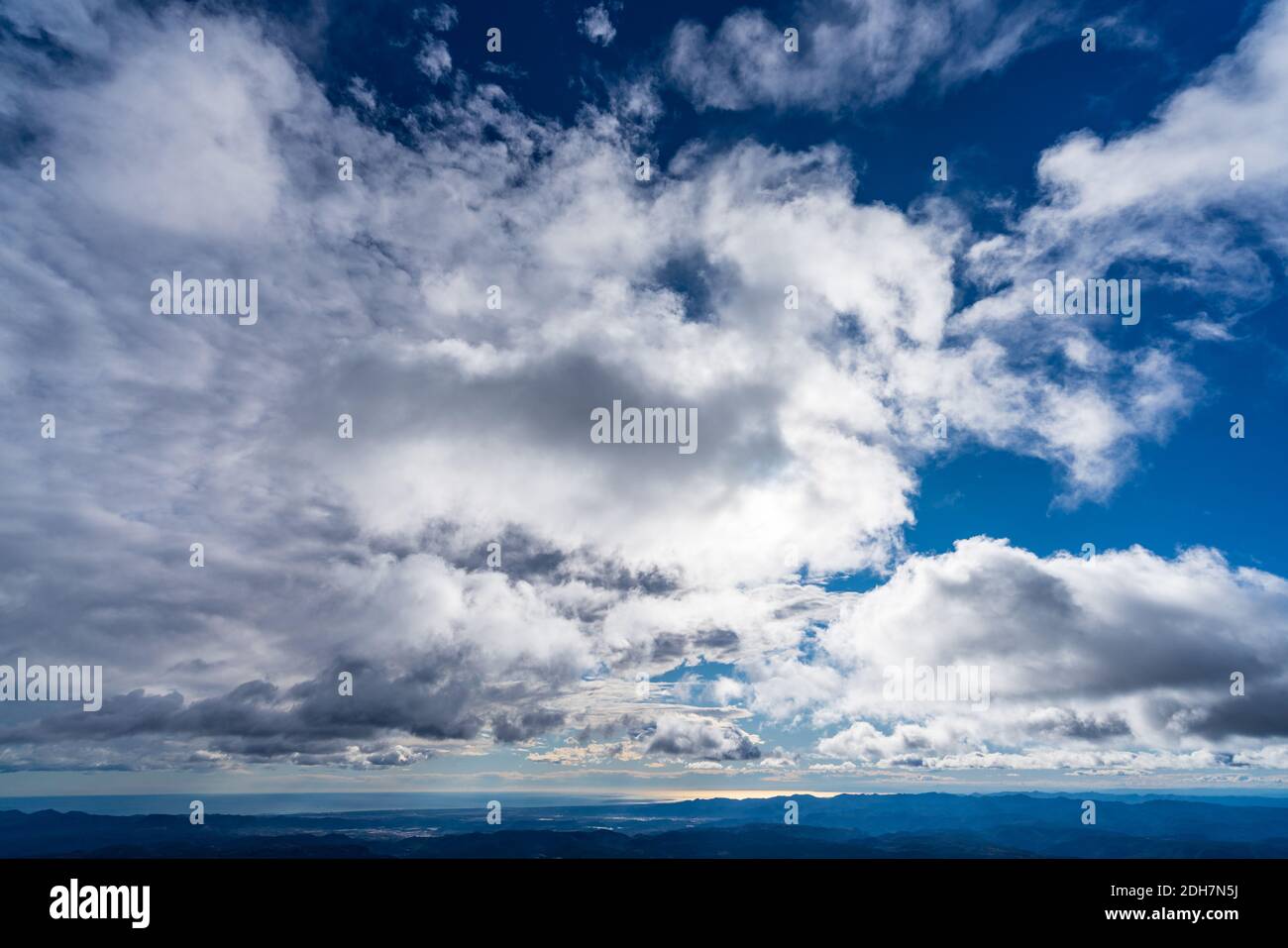 Sky background with ocean in the skyline Stock Photo