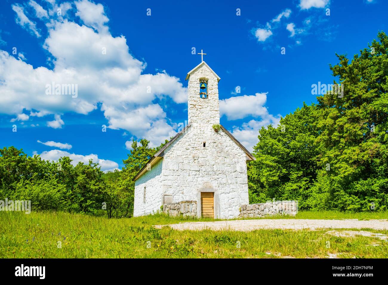 St Francis church near Gacka river in Lika reagion in Croatia, countryside landscape Stock Photo