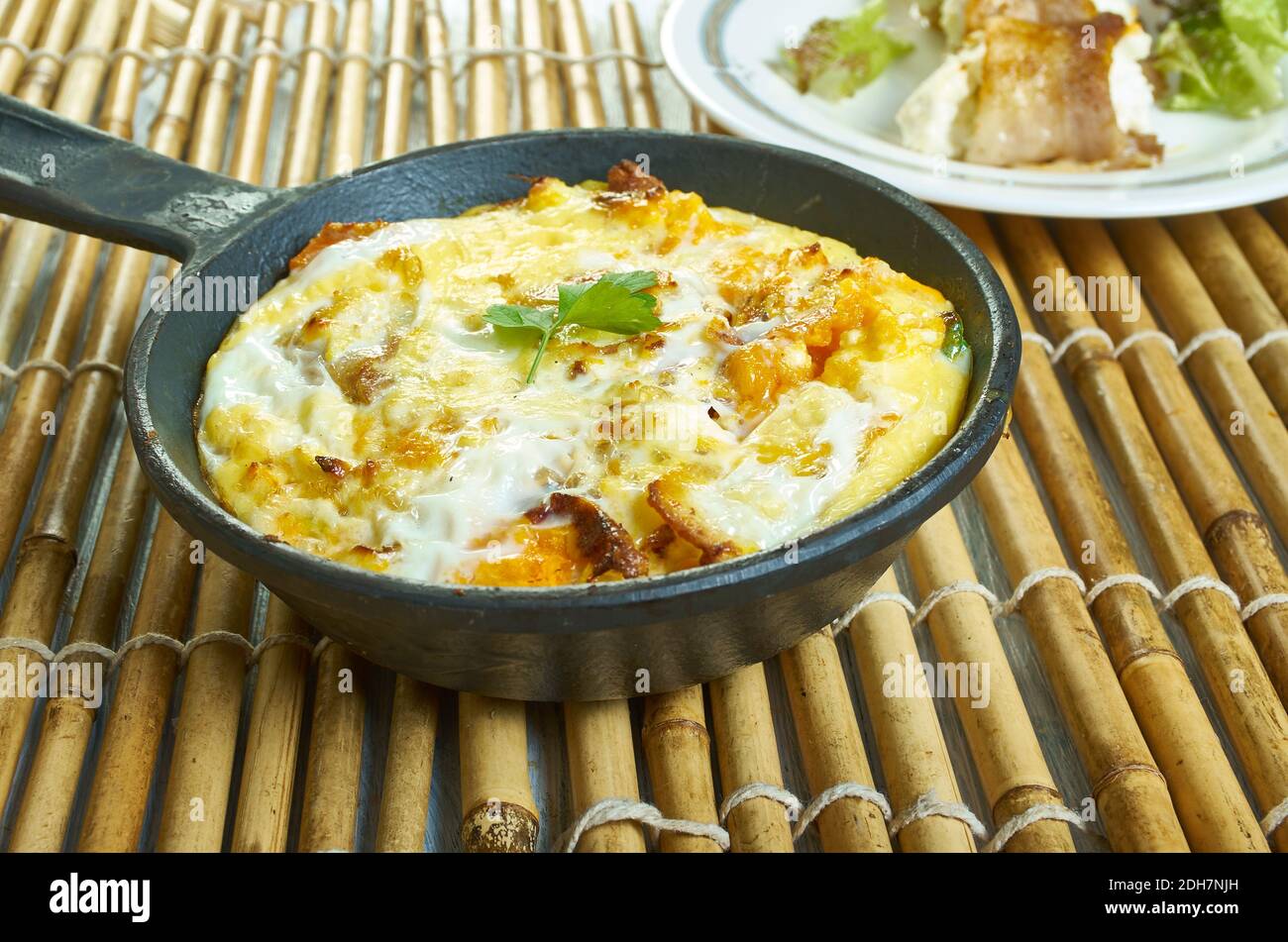 Bacon, ricotta, pumpkin ovenbaked frittata Stock Photo Alamy