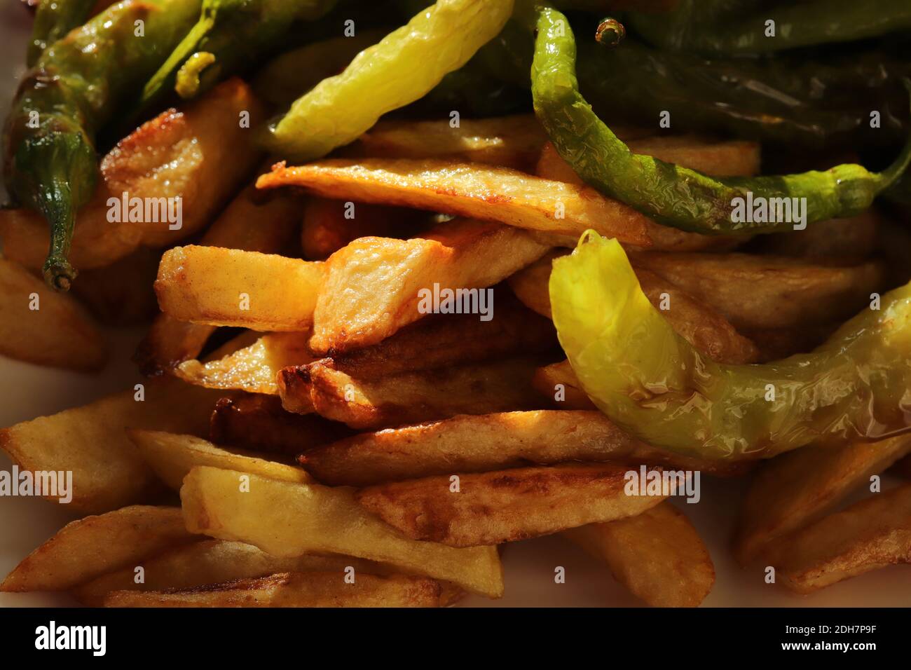 French fries and peppers. Food background Stock Photo Alamy