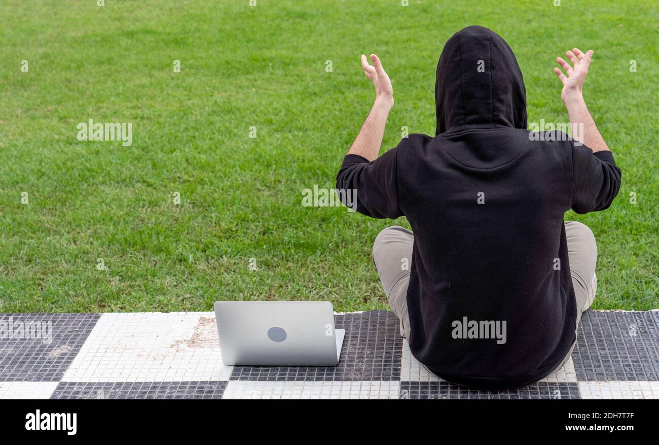 Sporty young man laptop hi-res stock photography and images - Alamy