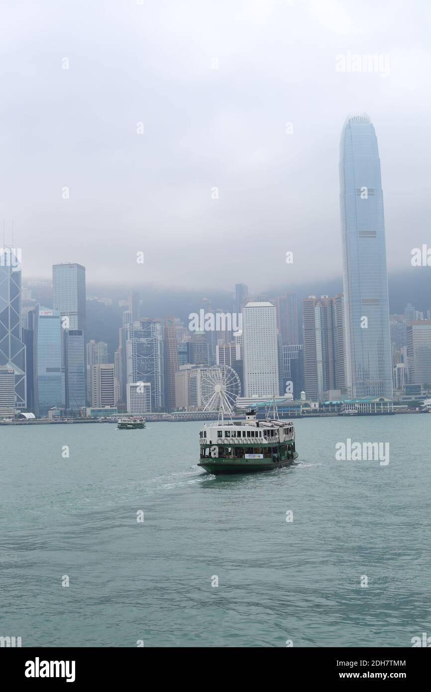 boat crossing Hong Kong harbor Stock Photo