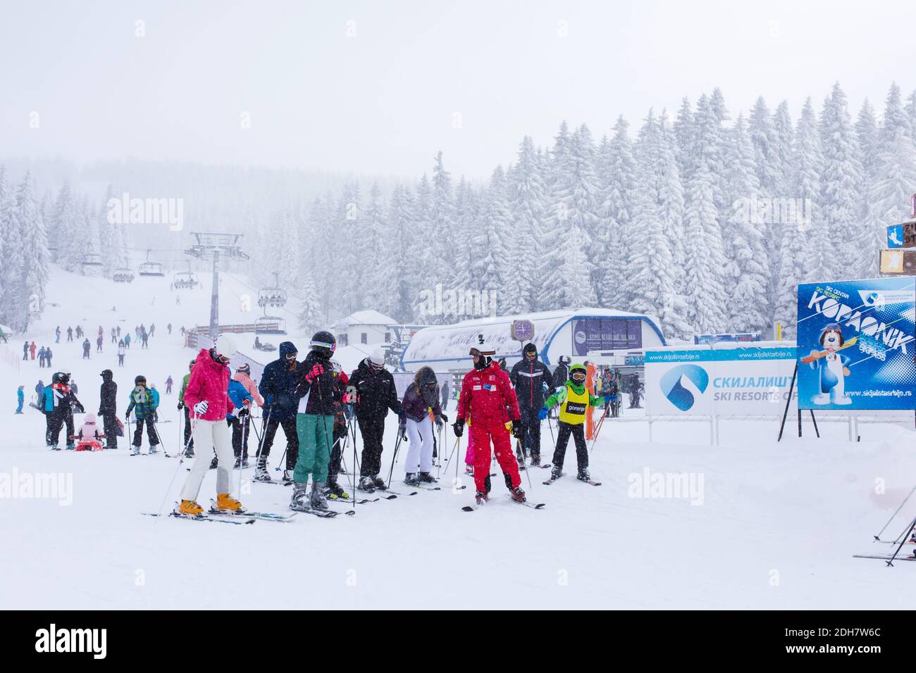Panorama of ski resort Kopaonik, Serbia, skiers, lift, pine trees Stock Photo