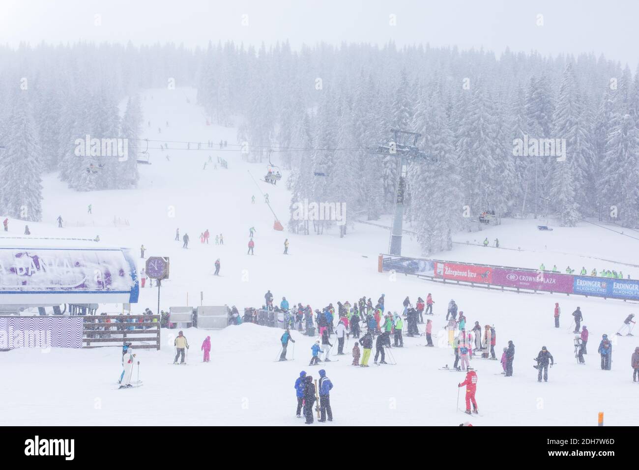 Panorama of ski resort Kopaonik, Serbia, skiers, lift, pine trees Stock Photo