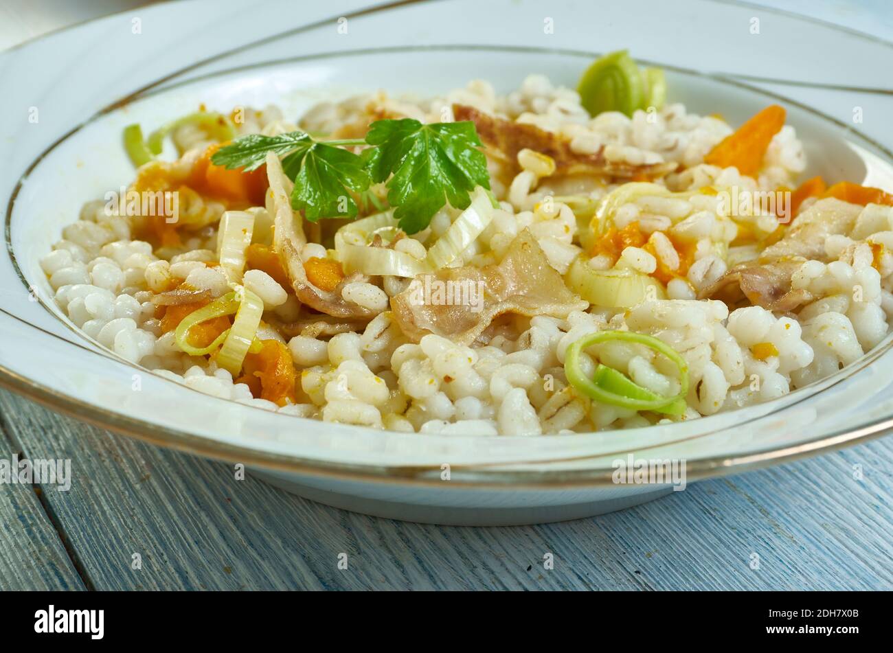 Pearl barley, bacon leek casserole Stock Photo Alamy