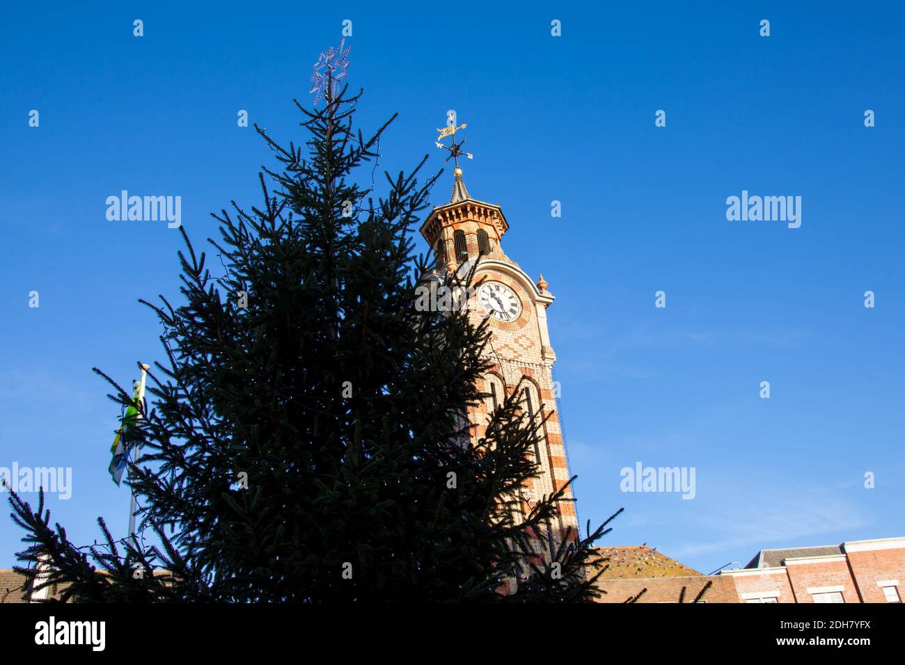 Epsom clock tower with Xmas tree at Christmas in Epsom, Surrey, UK, December 2020 Stock Photo