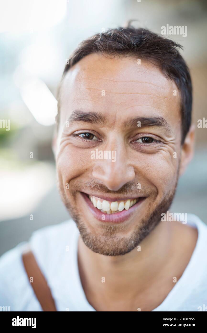 Portrait of happy businessman outdoors Stock Photo