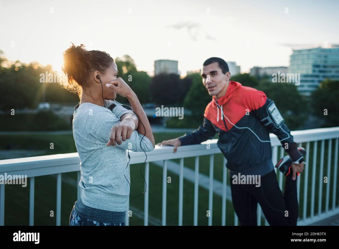 People Standing Behind Railing Touching the railing hi-res stock photography and images - Alamy